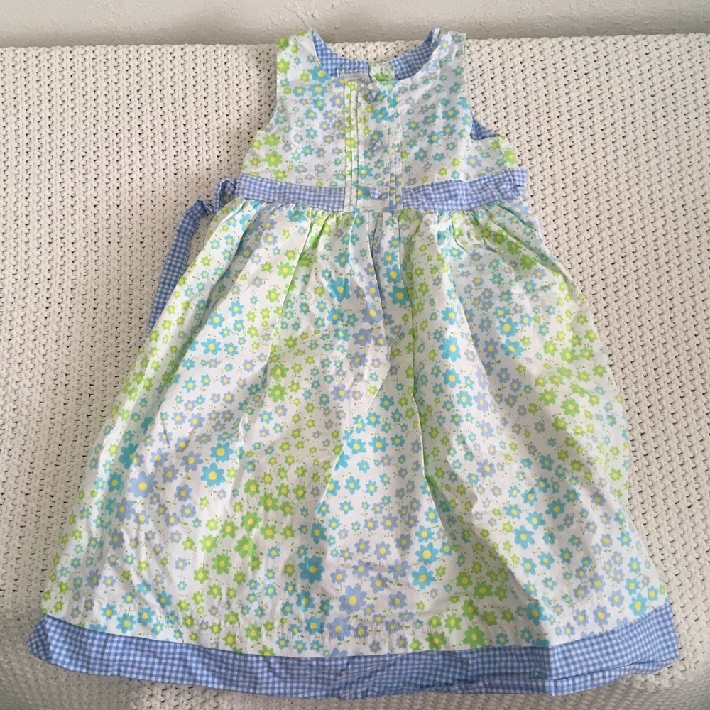 Marmellata flower print dress with ruffle underlay.  size girl 6